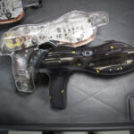 CyberBlast Pro phaser, clear and smoked case side-by-side