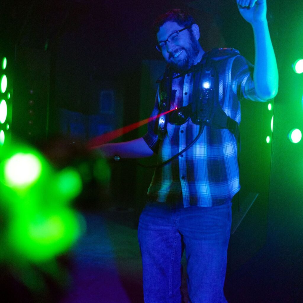 Man in LaserBlast laser tag equipment being tagged