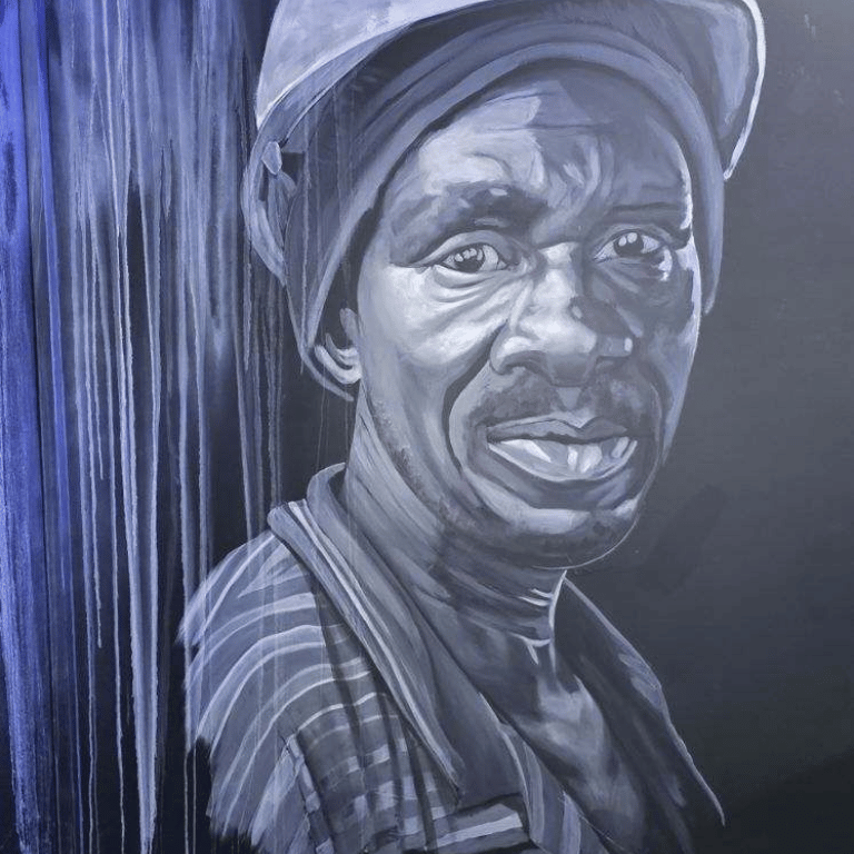 Historic miner painted on the wall of the Gold Reef Theme Park laser tag arena.