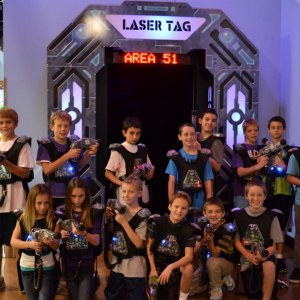 Group of boys in laser tag gear at the enterance to a laser tag arena at Arena 51.