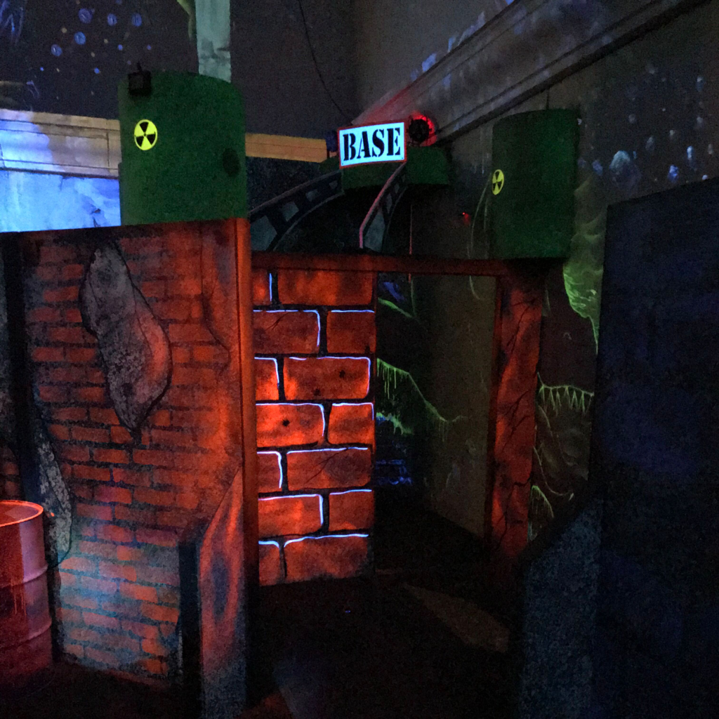 Inside of a ruin city theme laser tag arena.