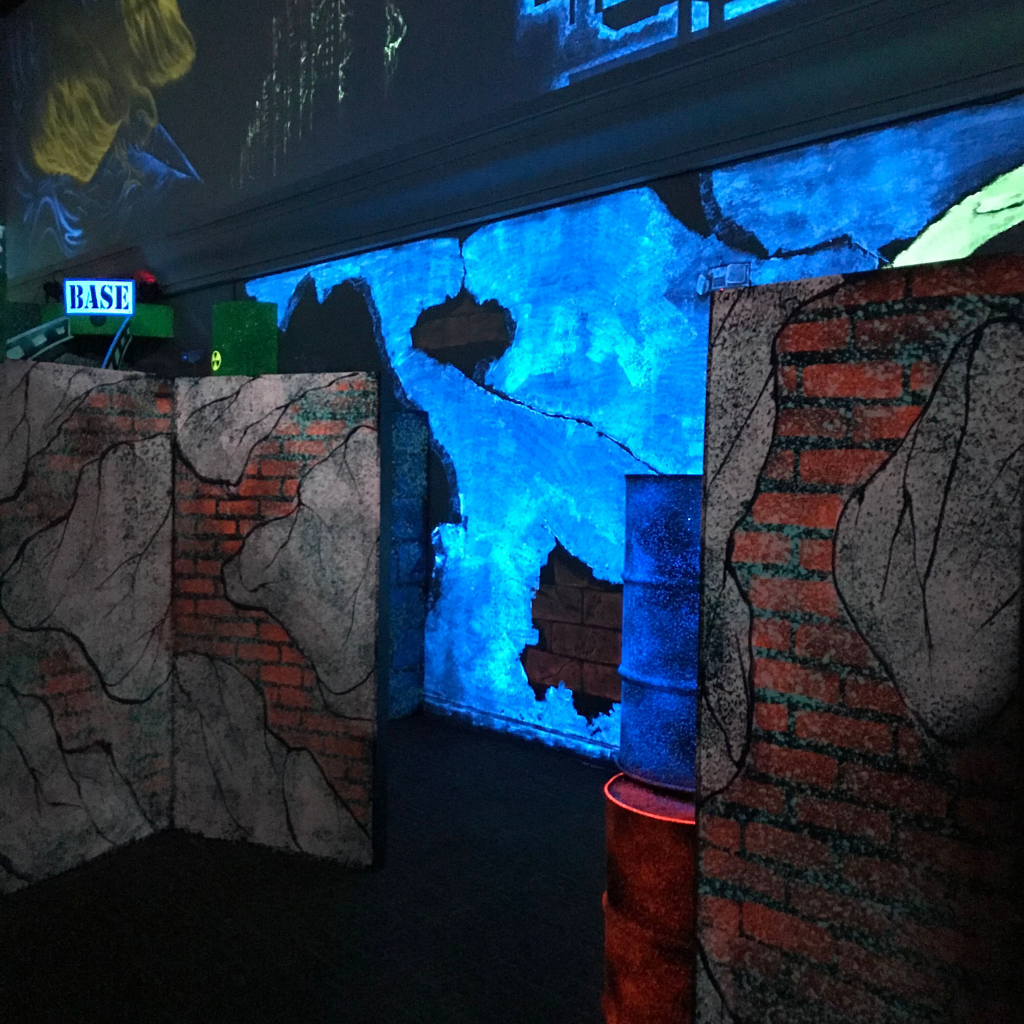 Inside of a ruin city theme laser tag arena.