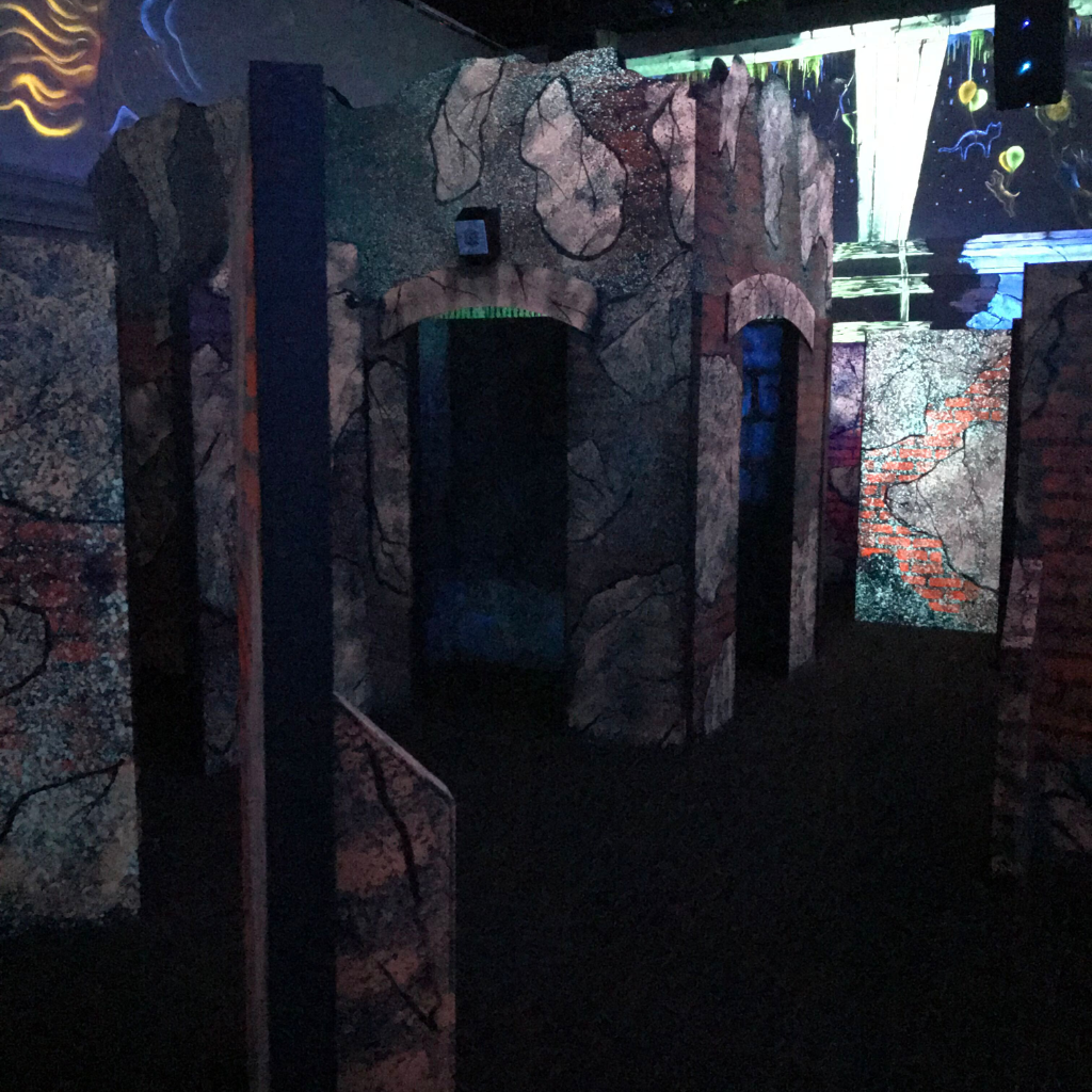 Inside of a ruin city theme laser tag arena.