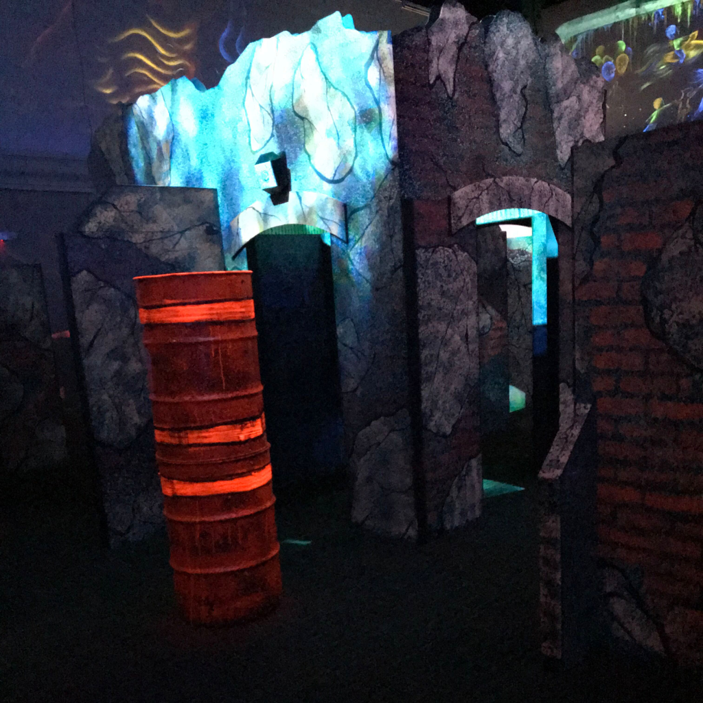 Inside of a ruin city theme laser tag arena.